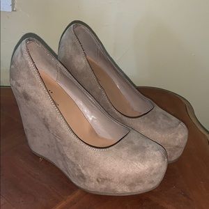 lightly worn beige wedges